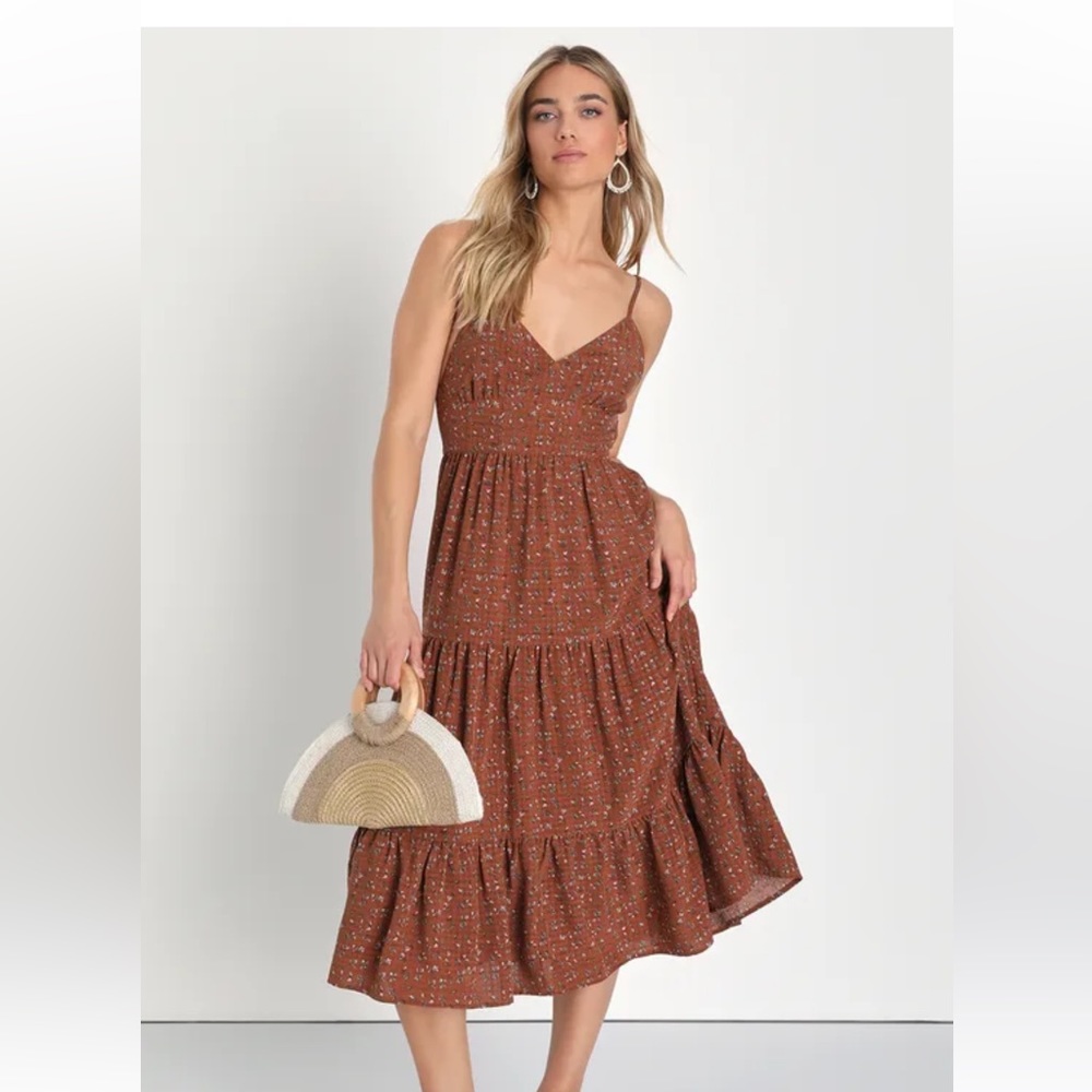 NWT brown tiered floral minidress size small. Side zipper closure